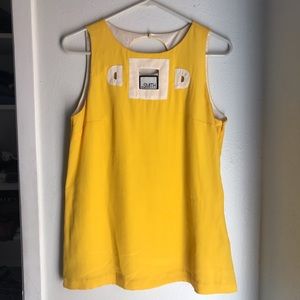 Yellow silk top with cutouts